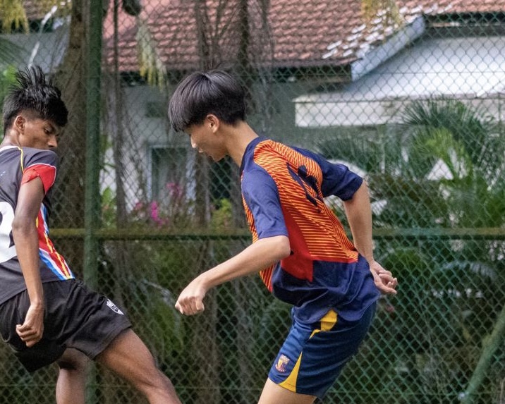 Child playing with ball